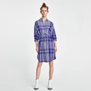 Zara blue and white cotton dress. Button front and elastic waist tie closure. SM
